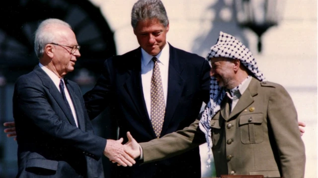 A peace accord was signed in the 1990s between Israeli Prime Minister Yitzhak Rabin (L) and PLO Chairman Yasser Arafat (R) 